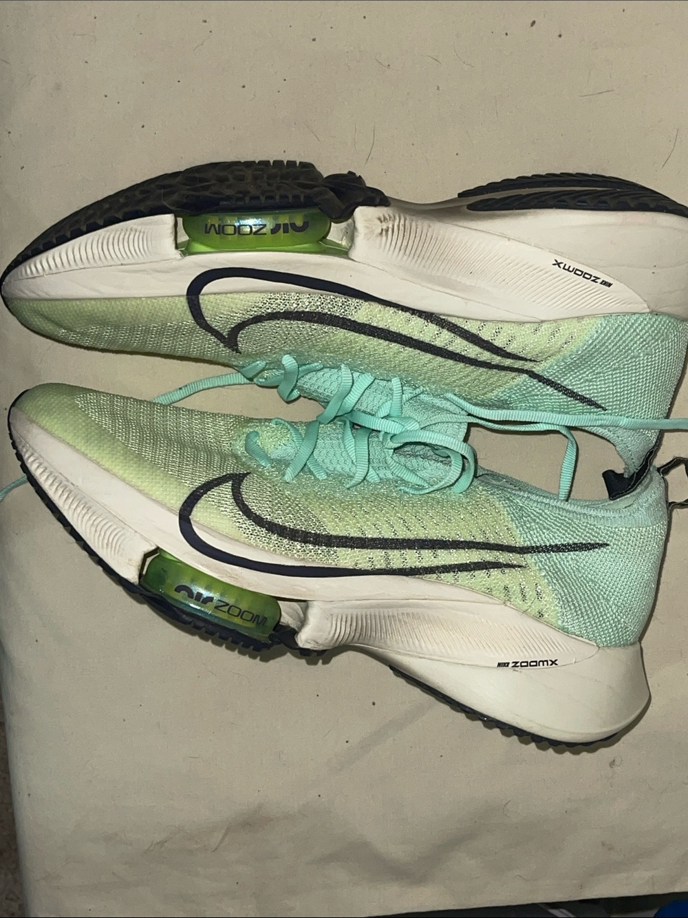 Nike Air Zoom Tempo NEXT% Flyknit sneakers in the Barely Volt/Mint Foam colorway - Picture 5 of 9